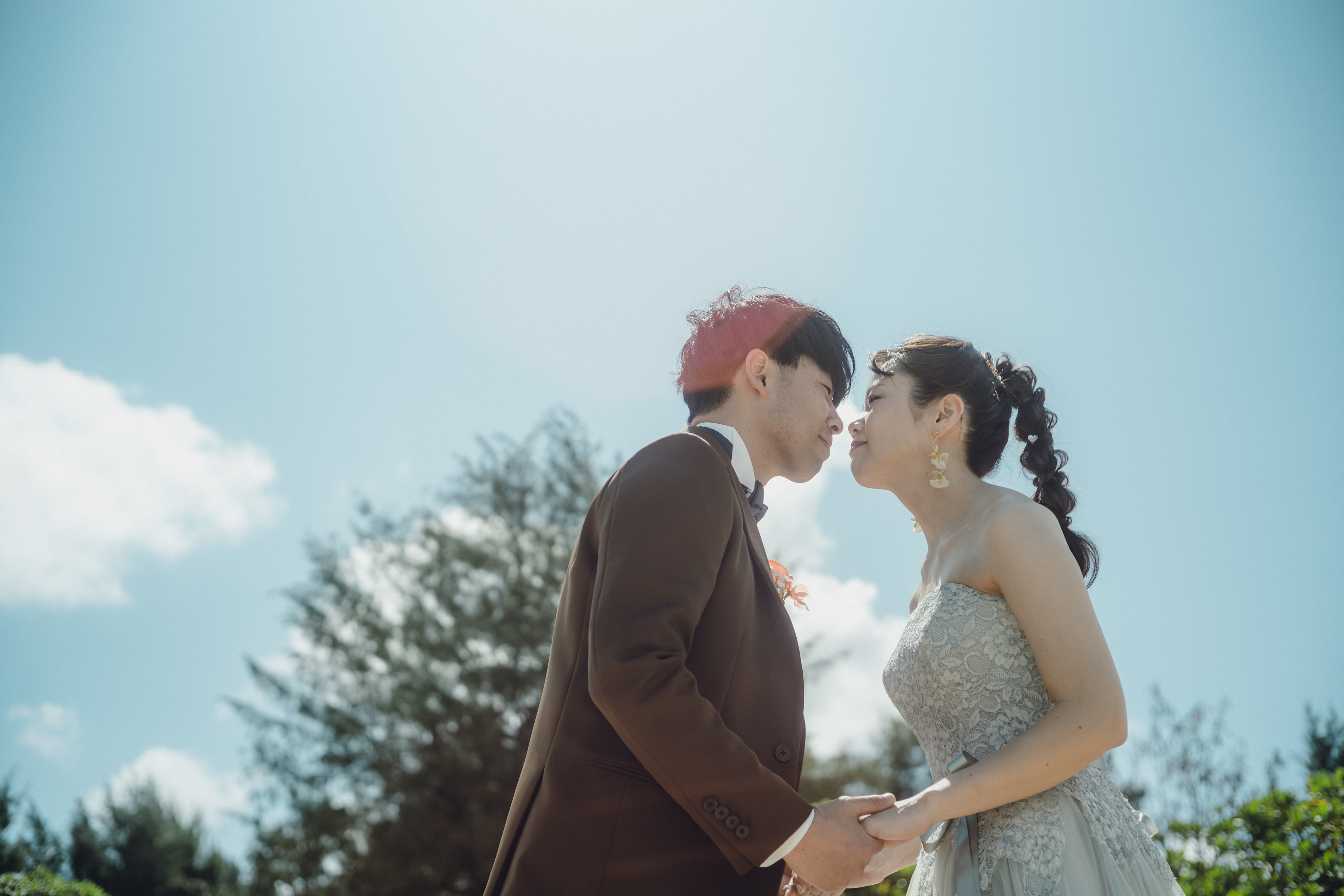 家族と一緒に!ビーチ撮影でリゾート婚ならではの一枚を♡