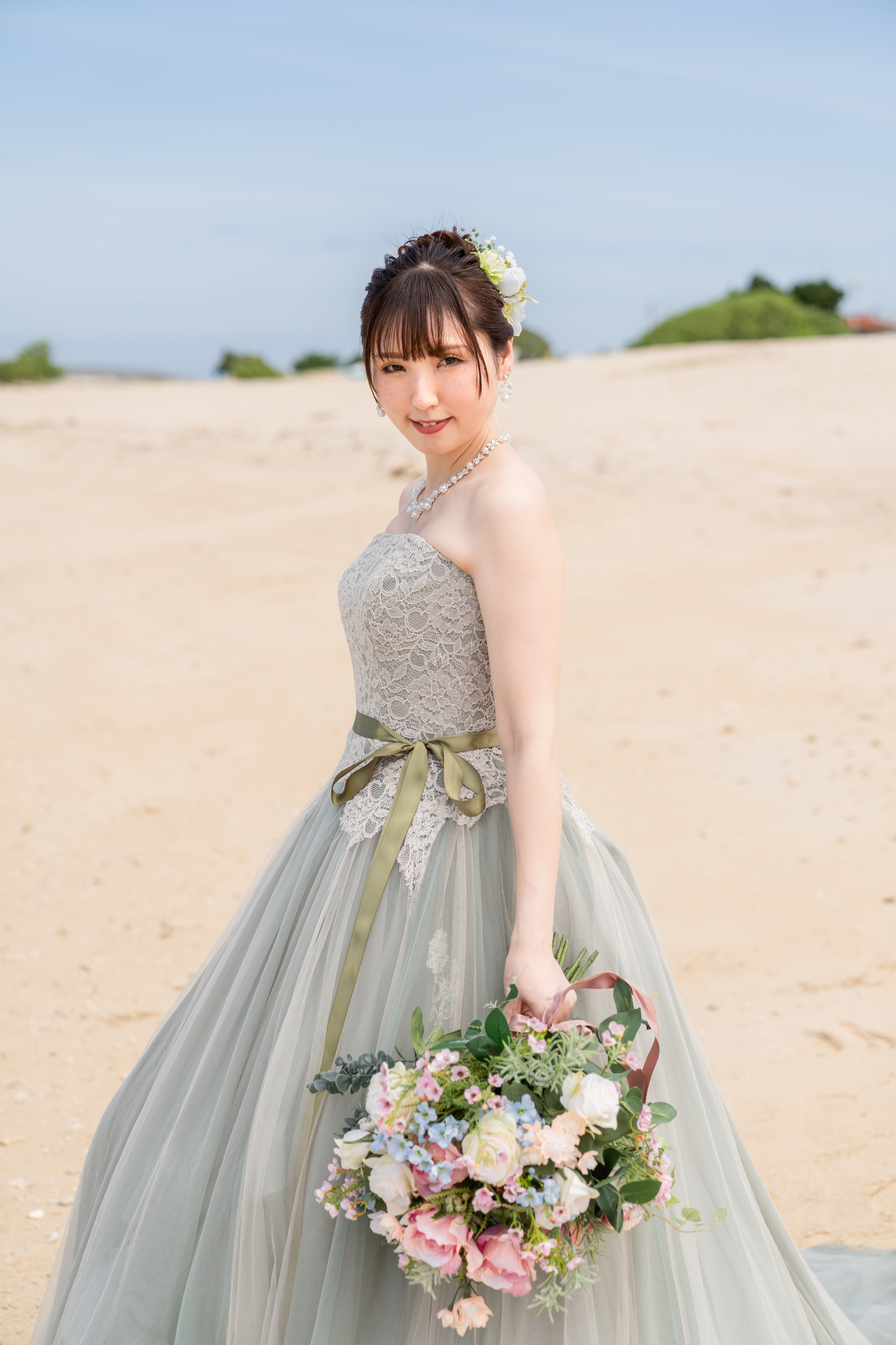 海と笑顔に包まれたフォトウェディング