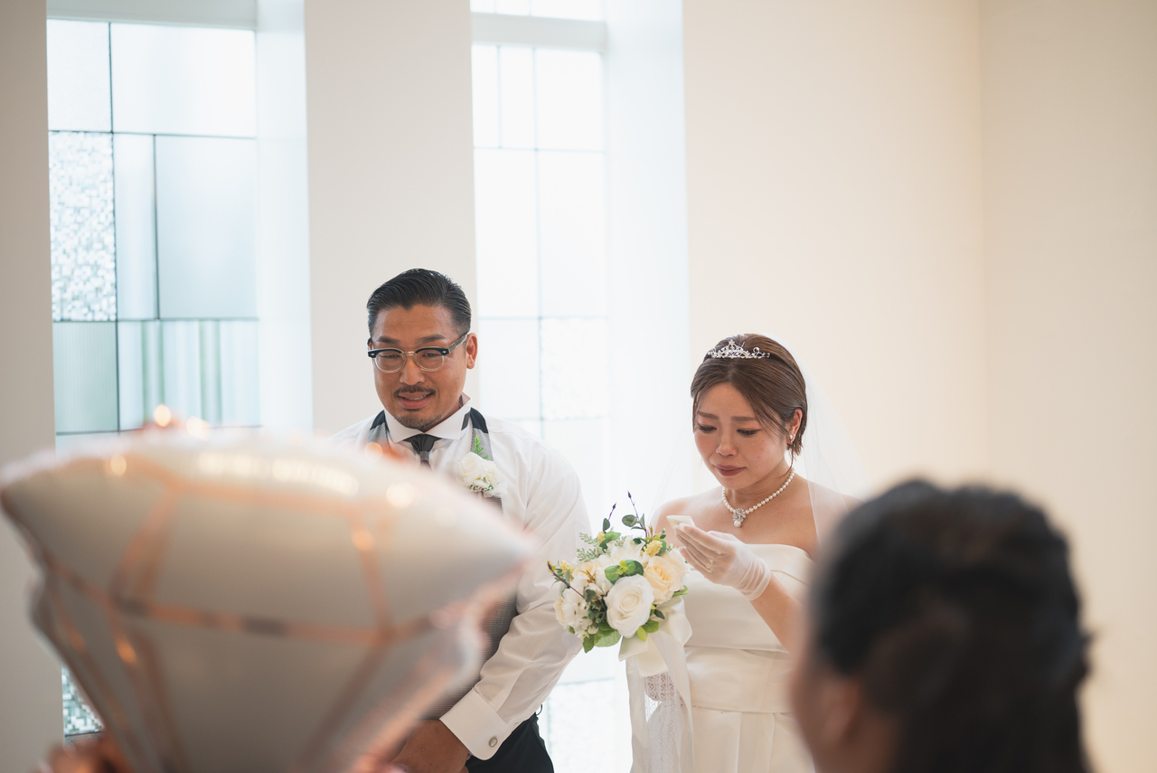 家族から新郎新婦へサプライズ挙式
