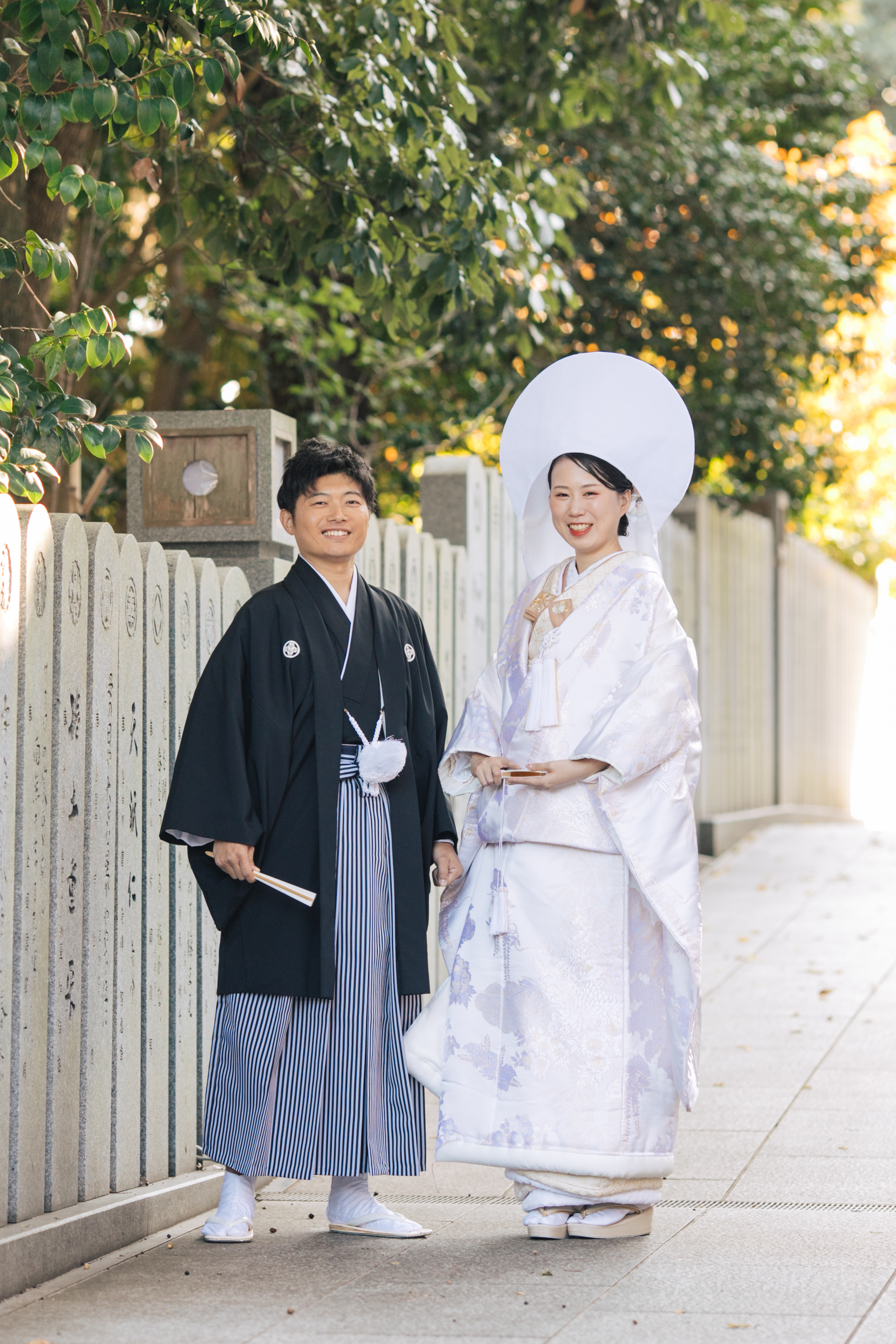 伊豫豆比古命神社 椿祷殿（椿神社）で挙げられたお客様の結婚式　紋付袴姿の新郎様と白無垢綿帽子をつけた新婦様